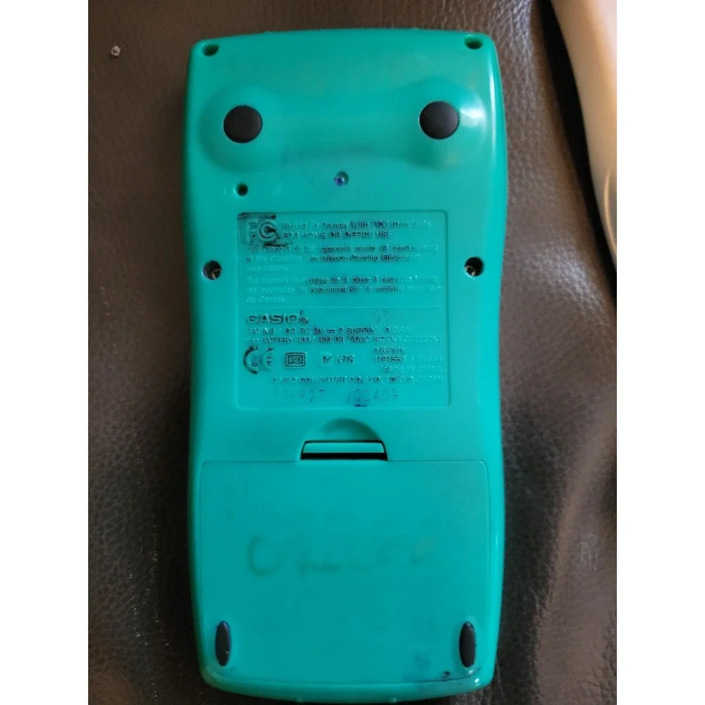 Casio fx-9750G PLUS Graphing Calculator – Works! Marked‎ Up – No Batteries